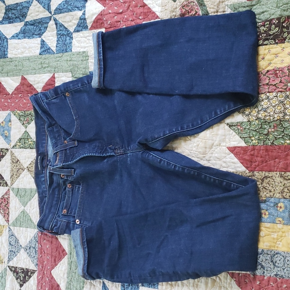 9" inch high rise toothpick dark jeans.